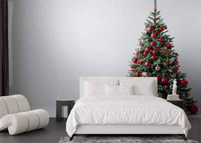 Christmas tree with red decor balls in the white room, copy space for text, greeting cards , art, portraits  Wall mural