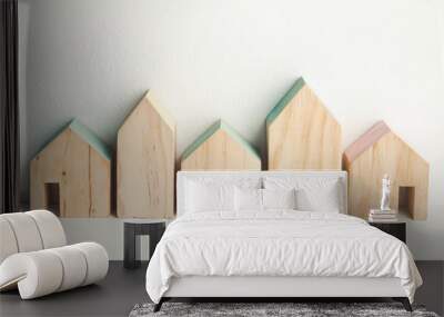 Wooden houses on the wall background Wall mural