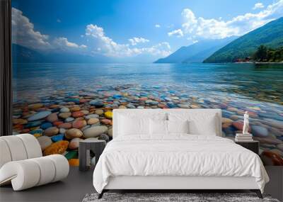 The sea is full of colorful pebbles, and the pebble beach on both sides is covered with many colored glass stones Wall mural