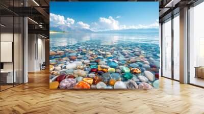 The sea is full of colorful pebbles, and the pebble beach on both sides is covered with many colored glass stones Wall mural