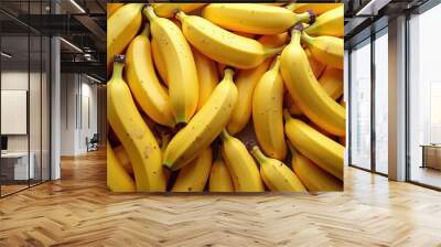 A vibrant and fresh heap of ripe bananas, perfect for illustrating healthy eating, fruit markets, or tropical themes in various media. Wall mural