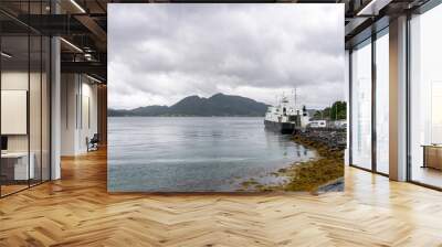 the ferry at the landing in the harbor of Halsa on the Helgeland coast of Norway Wall mural