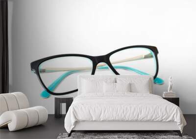 Black plastic eyeglass frame with turquoise accents. Isolated Wall mural