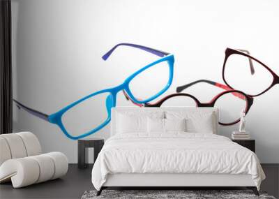 Three pairs of colorful children's glasses.  Isolated Wall mural