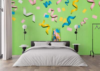 Celebration Flat lay with colorful party items on green background. Wall mural