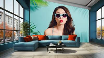 Summer fashion portrait of beautiful elegant asian woman posing in summer outfit Wall mural