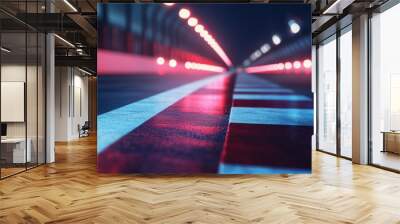 Finish line on a racetrack with glowing spotlights and motion blur creating a sense of speed and energy Wall mural