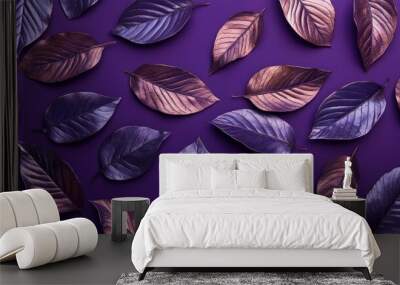 Metallic dry leaves arranged on a violet background creating a striking contrast between natural and industrial elements Wall mural