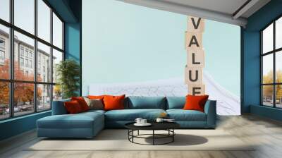 word Value with wood building blocks, light green background Wall mural