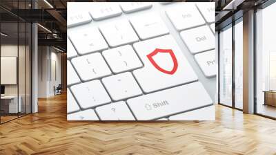 protection concept: contoured shield on computer keyboard backgr Wall mural