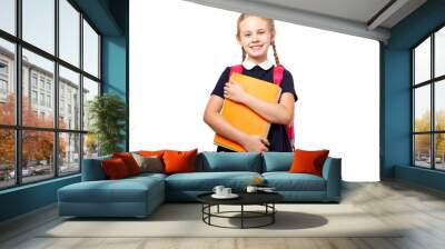 Cheerful 8 years old schoolgirl with backpack wearing uniform standing isolated over white background. Ready for school Wall mural