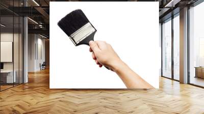 Hand holding big paintbrush isolated on white Wall mural