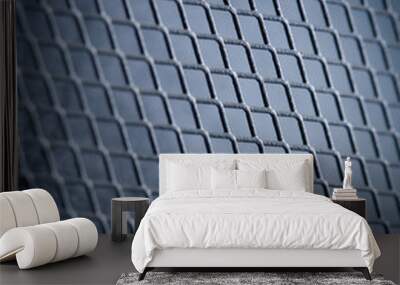 Metal grid on blue background Wall mural