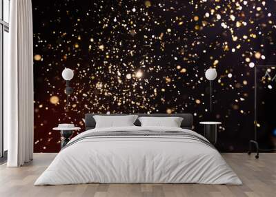 Photo of golden glitter on a black background. Golden explosion Wall mural