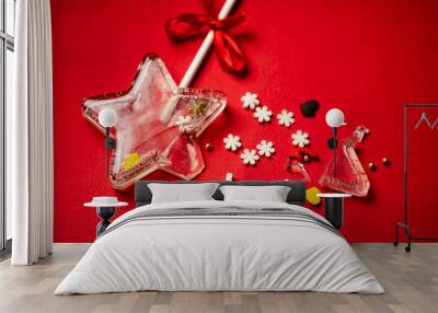 Christmas lollipop on the red background Wall mural