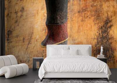 Hunting knife handmade on a wooden background Wall mural