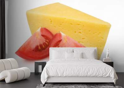 Tomato slices and a piece of cheese on an isolated white background. Wall mural