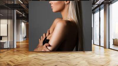 blond hair on grey Wall mural