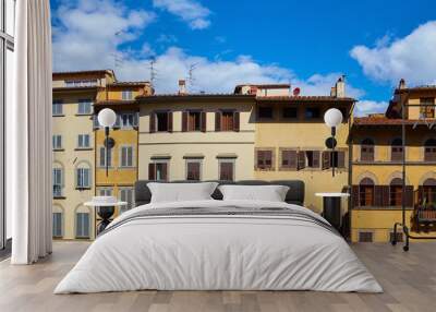 Facades of different old houses on Piazza de Pitti in Florence, Italy  Wall mural