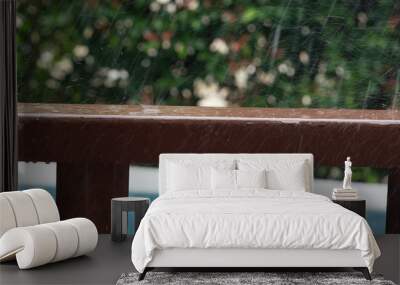 Rain drops on wooden railing Wall mural