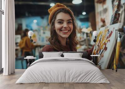 A young woman in a cheerful art studio, painting a vibrant picture with a joyful smile, expressing her creativity and positive outlook despite her illness. Wall mural