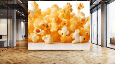 Delicious popcorn kernels popping in the air against a clean white background Wall mural