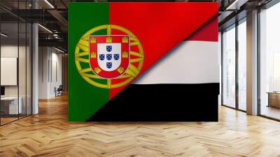 The flags of Portugal and Yemen. News, reportage, business background. 3d illustration Wall mural