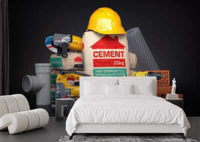 Construction materials and tools on black background. Wall mural