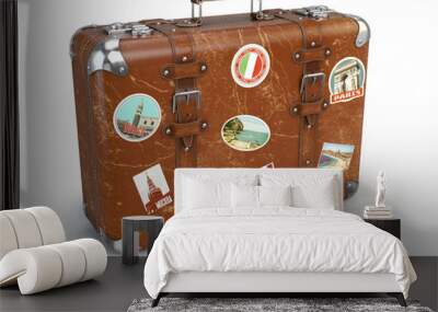 Retro suitcase beggage with travel stickers isolated on white ba Wall mural