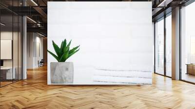 White towels on white table with copy space on bath room background Wall mural