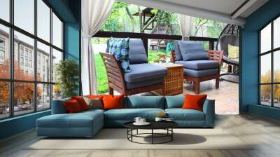 Patio of a house. Two soft armchairs Wall mural