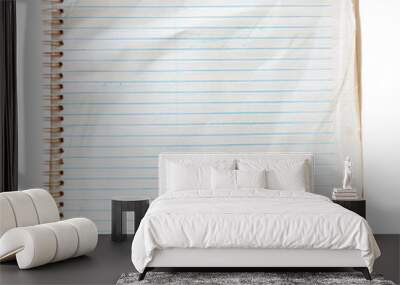 A spiral bound notebook with blue and white lines Wall mural