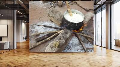 Preparing banku on a fire, Africa Wall mural