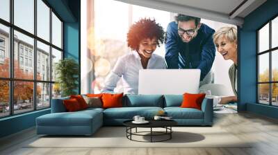 Business people, laptop and meeting in planning, teamwork or coaching for project on bokeh background at office. Group of happy employees working on computer for schedule plan, ideas or team strategy Wall mural