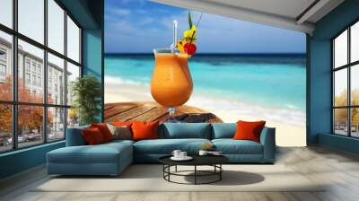 Bocal of fruity cocktail on a beach table Wall mural