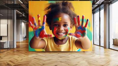 Black african american dark-skinned cute cheerful girl showing her hands painted  Wall mural