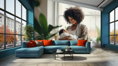 Black african american dark-skinned happy loving mother takes care of her newborn at home Wall mural