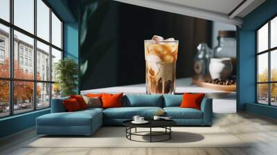 Vietnamese iced coffee sweetened condensed milk and ice in the glass. Asian summer local food and beverages.  Wall mural