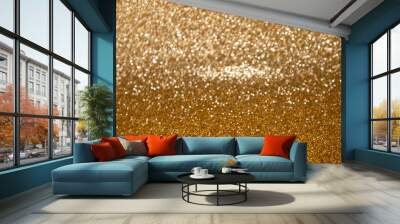 Gold glittering Christmas lights. Blurred abstract background Wall mural