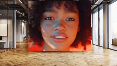 A close-up view of a young girl with curly hair Wall mural