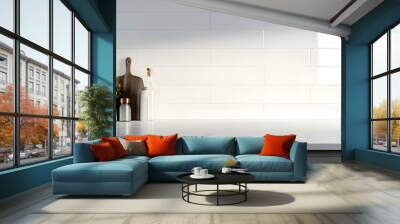 A close-up view of an empty countertop in a sleek gray kitchen cabinet, with white ceramic wall tiles in the background, perfect for showcasing household items. Wall mural