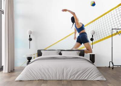 Volleyball, sports and woman jump at beach to hit ball in competition, game or match. Training, exercise and female athlete jumping for spike in tournament for workout, fitness and health at seashore Wall mural