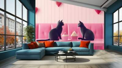 Two cats sitting at the table on a pink sofa in cafe with cup of coffee and cupcakes. Valentine day celebration idea. Greeting card. Abstract aesthetic concept of love and passion.    Wall mural