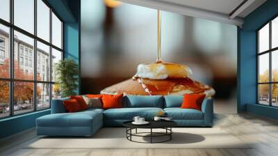 golden pancakes with dripping maple syrup close-up Wall mural