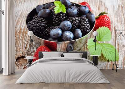 Ripe berries, blueberries, strawberries, blackberries, fresh vitamins, rustic background selective focus Wall mural