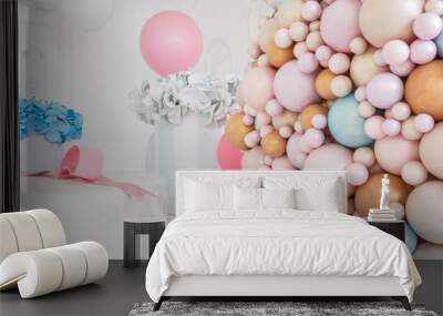 boxes with flowers and a large pudrinitsa with balls and balloons in room decorated for birthday par Wall mural