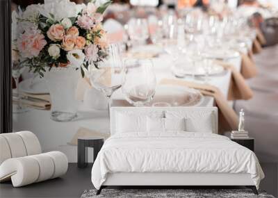 tables set for an event party or wedding reception. luxury elegant table setting dinner in a restaur Wall mural