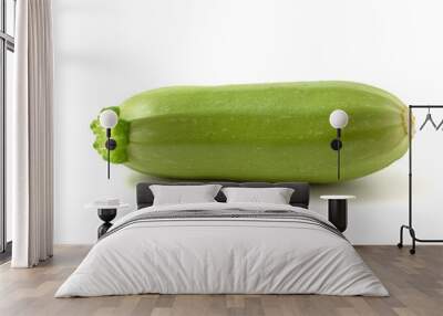 Little fresh young green zucchini on a white background Wall mural