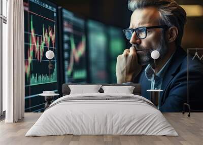 Busy serious middle aged business man financial investor, stock trader broker analyzing online market price thinking of investing money in digital crypto trading exchange checking funds value. Wall mural