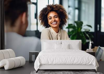 Female designer has a meeting with team, African American business woman at diverse team office meeting. Smiling professional businesswoman company employee leader with tablet sitting in board room Wall mural